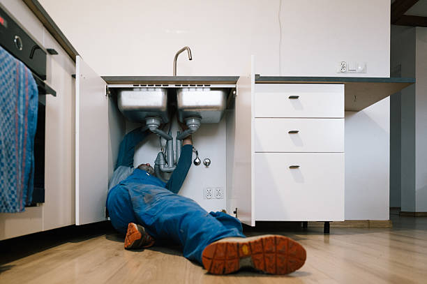 Professional Emergency Plumber technician working in Massapequa, NY